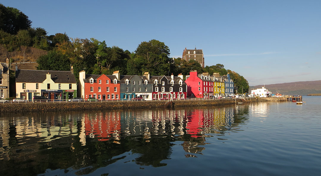 Colourful waterfront houses in Tobermory, Isle of Mull, overlooked by the Great Western Hotel