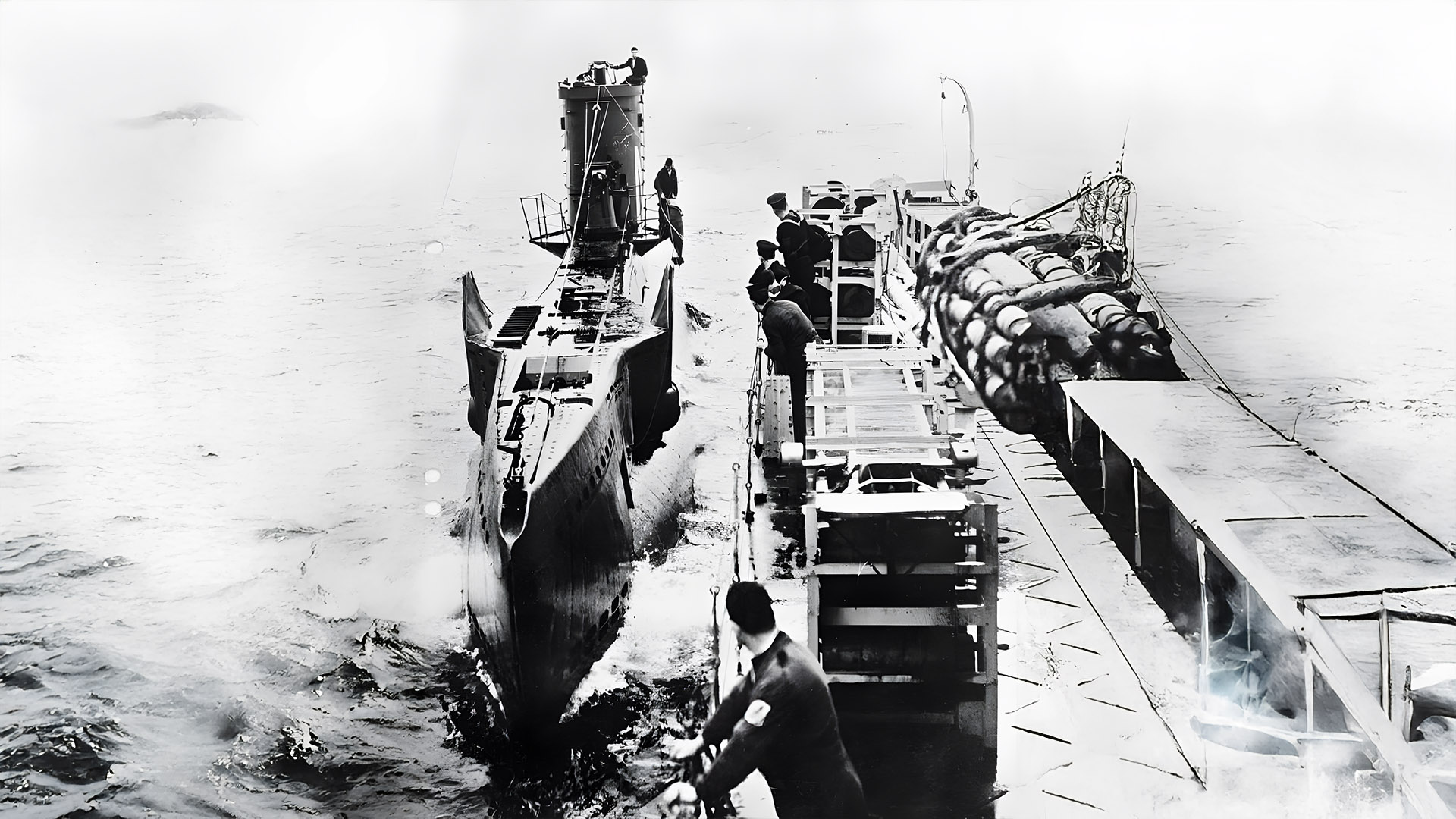 A British submarine surfaces after being chased for two hours by a frigate during training at HMS Western Isles, Tobermory, Mull.